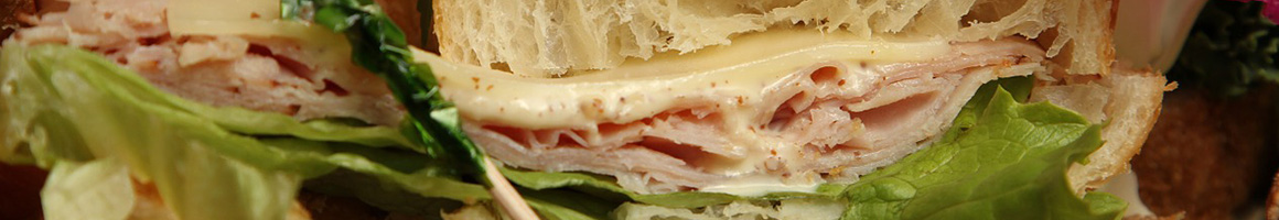 Eating Sandwich Tex-Mex Vegetarian at Natural Cafe restaurant in Santa Barbara, CA.